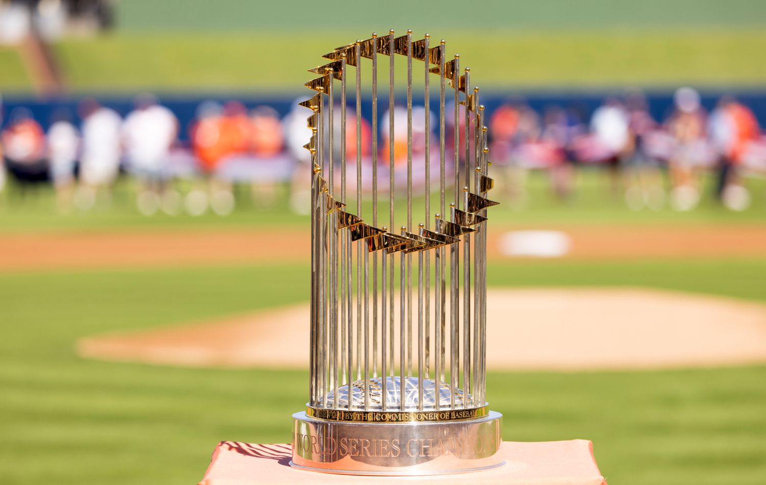 Feb 25, 2023; West Palm Beach, Florida, USA; The World Series trophy sits atop home plate prior to the game between the New York Mets and the Houston Astros at The Ballpark of the Palm Beaches.